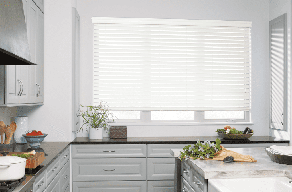 white faux wood blinds in kitchen