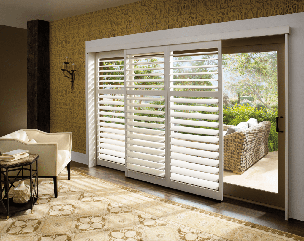 White window shutters for sliding glass door in living room