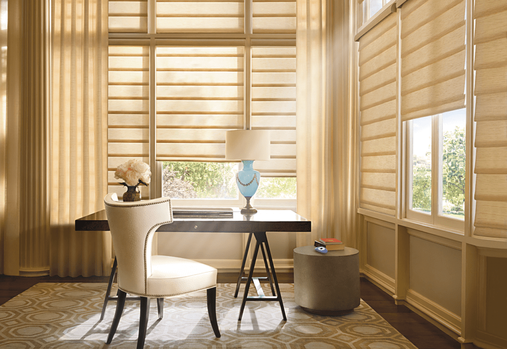 Tan neutral tone roman shades and drapery in elegant home office space