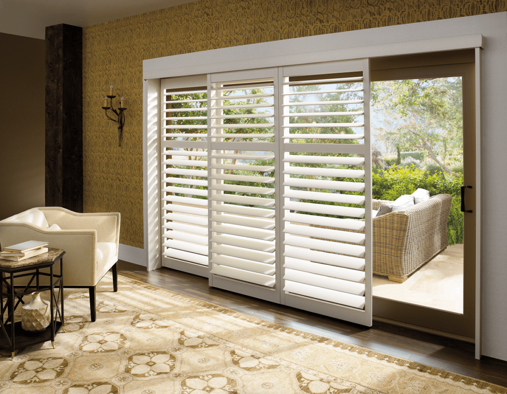 White window shutters for sliding glass door in living room