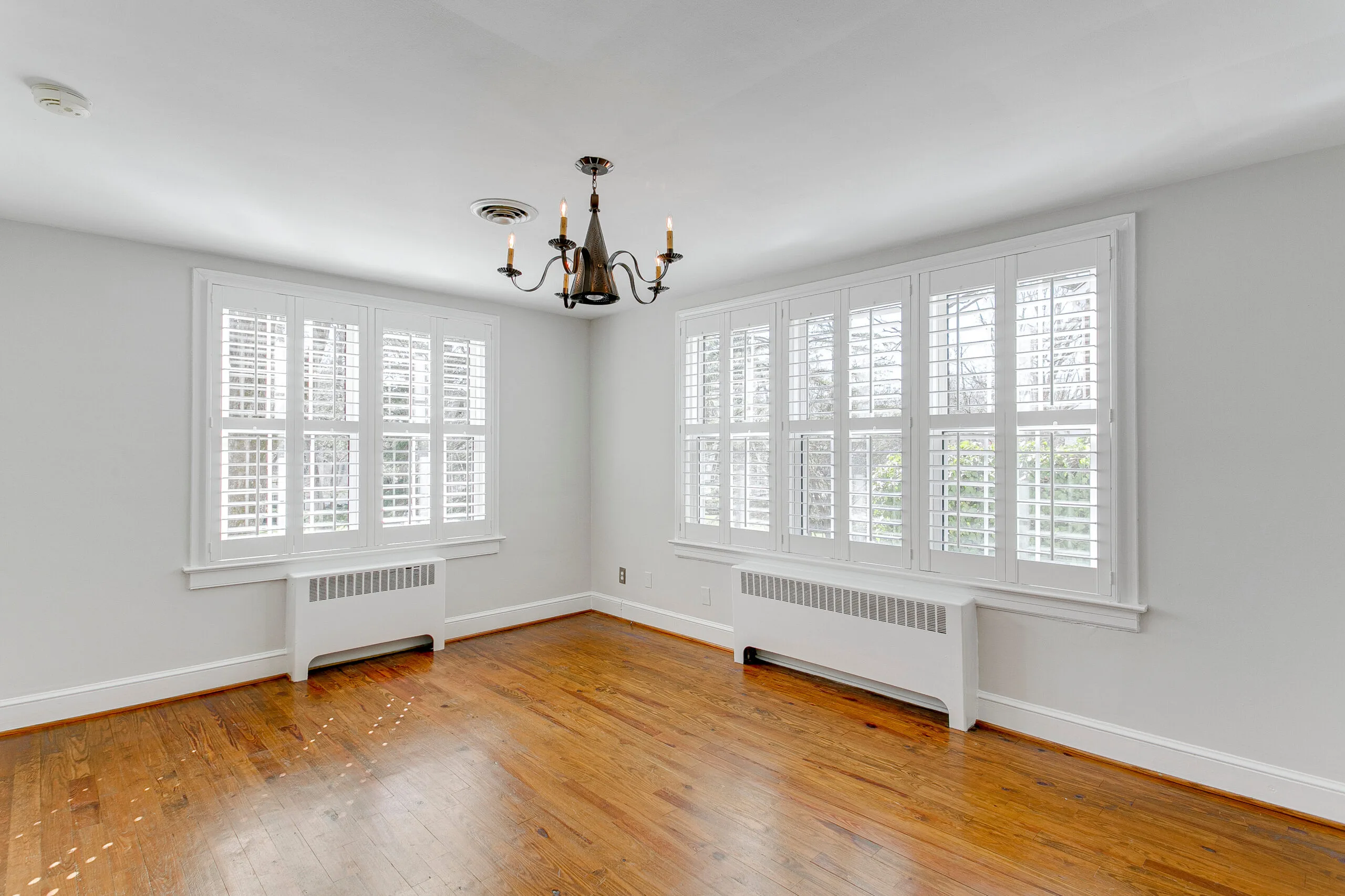 plantation shutters in empty bedroom