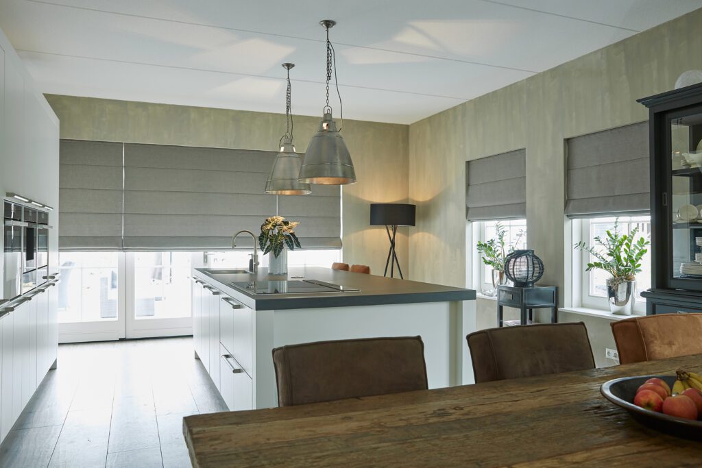 a kitchen with a table and chairs